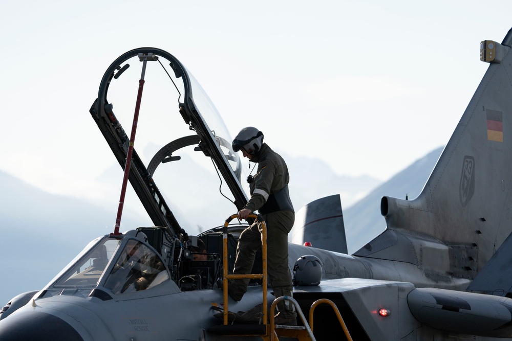 USAF F-22 Raptors and German Air Force PA-200 Tornados train at JBER