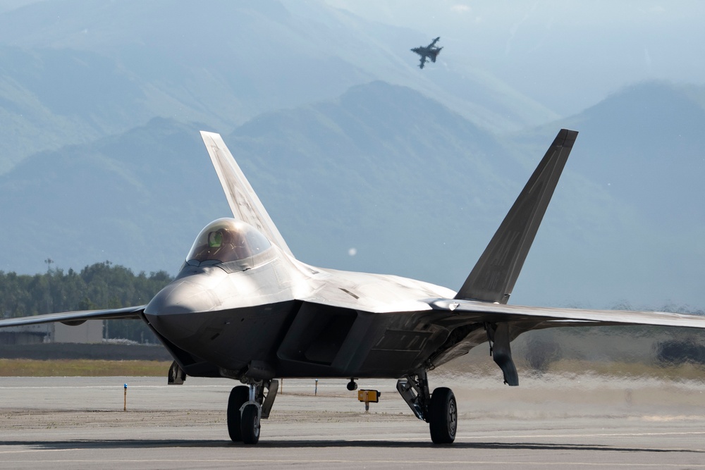 USAF F-22 Raptors and German Air Force PA-200 Tornados train at JBER