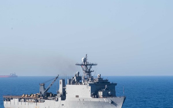 USS Dwight D. Eisenhower (CVN 69) Conducts PhotoX With USS Wasp