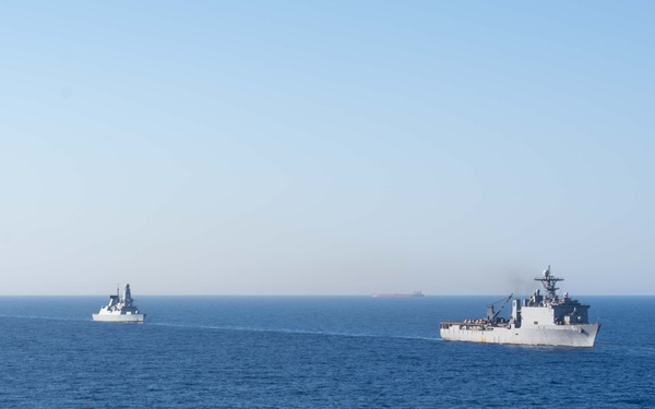 USS Dwight D. Eisenhower (CVN 69) Conducts PhotoX With USS Wasp