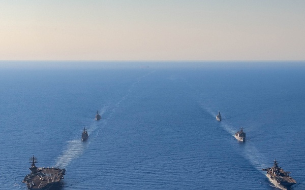 USS Dwight D. Eisenhower (CVN 69) Conducts PhotoX With USS Wasp