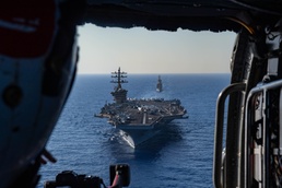 USS Dwight D. Eisenhower (CVN 69) Conducts PhotoX With USS Wasp