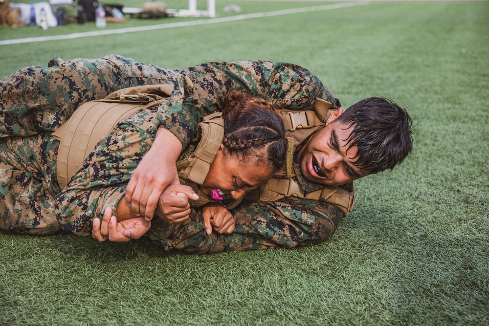 MARFORK Marines participate in a MCMAP MAI Course