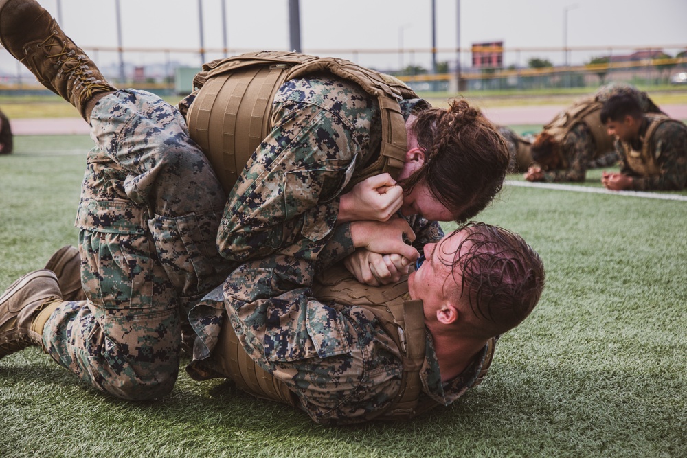 MARFORK Marines participate in a MCMAP MAI Course