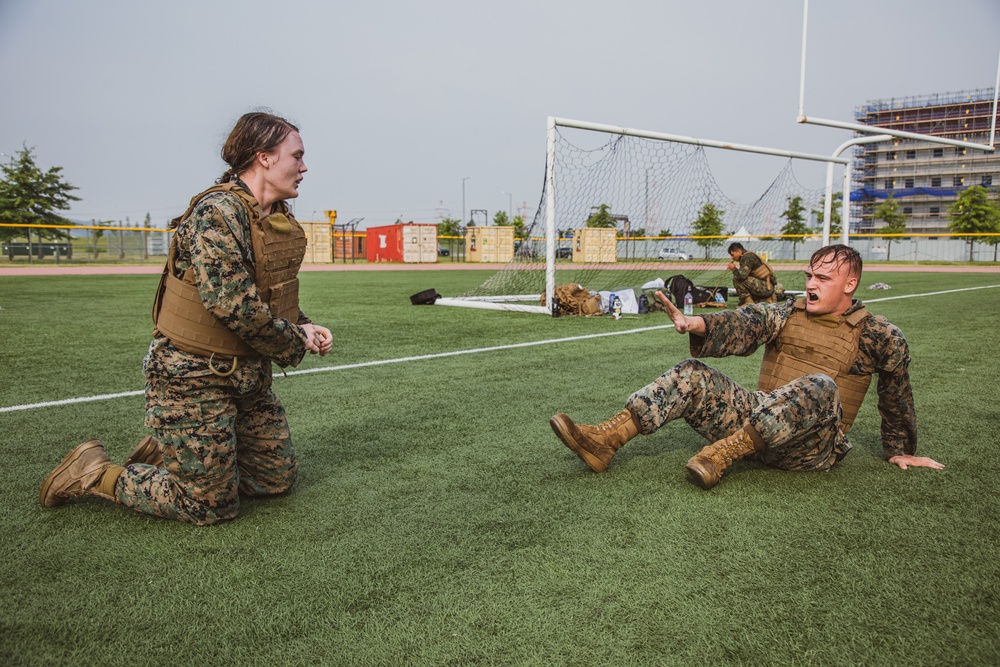 MARFORK Marines participate in a MCMAP MAI Course