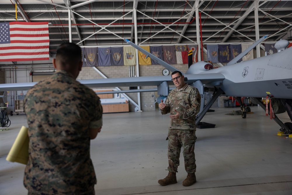 U.S. Marines learn about M-Q9 Reaper