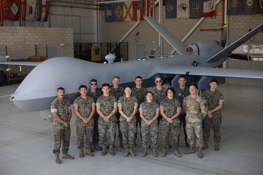 U.S. Marines learn about M-Q9 Reaper