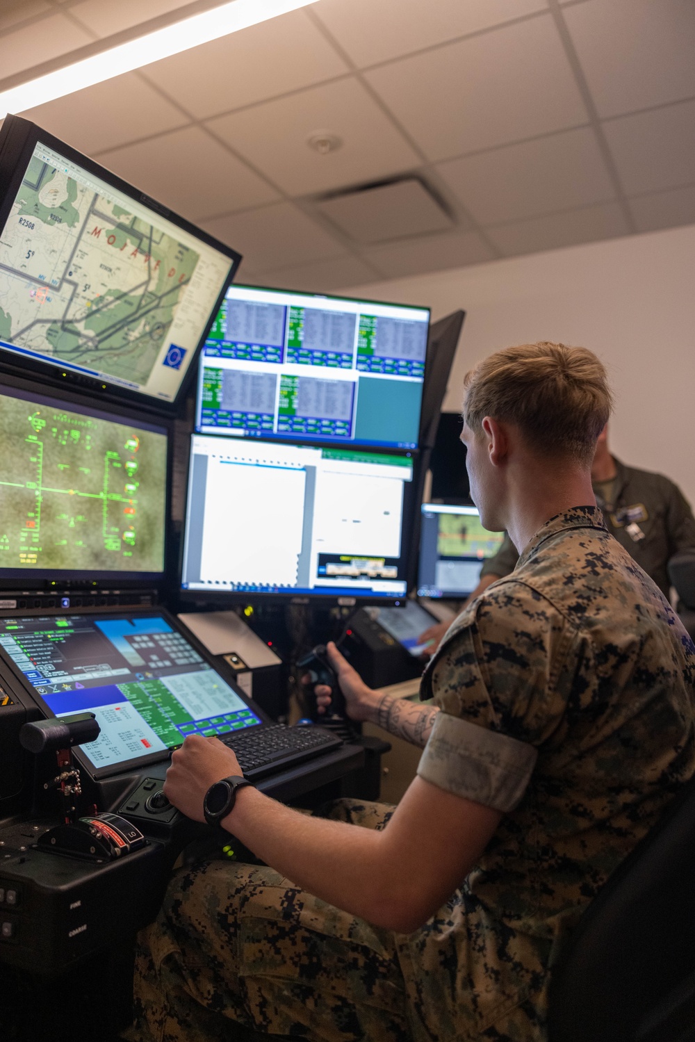 U.S. Marines learn about M-Q9 Reaper