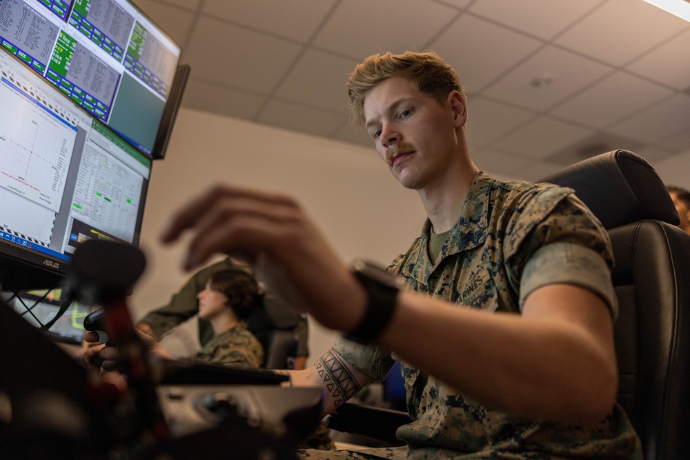 U.S. Marines learn about M-Q9 Reaper