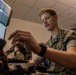 U.S. Marines learn about M-Q9 Reaper