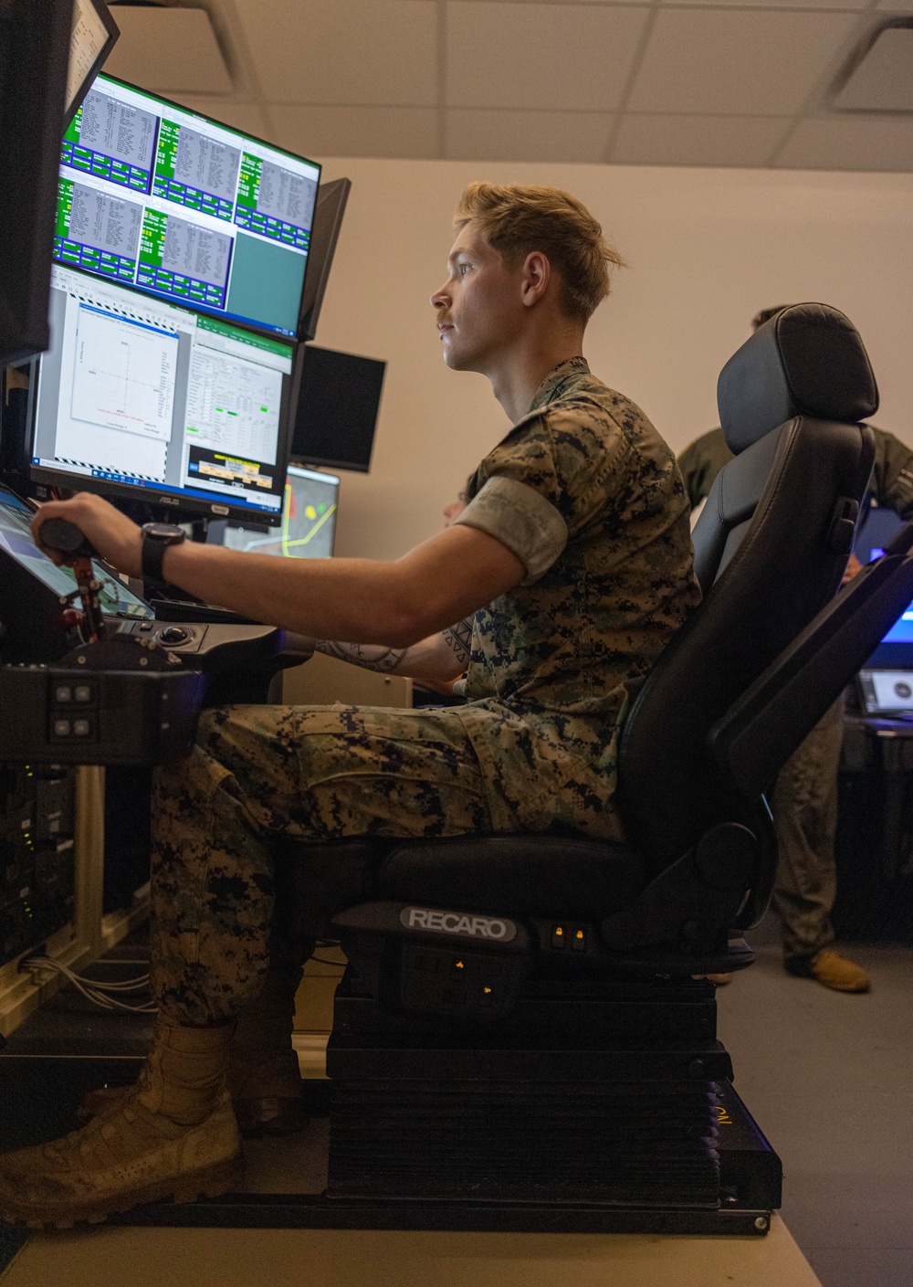 U.S. Marines learn about M-Q9 Reaper