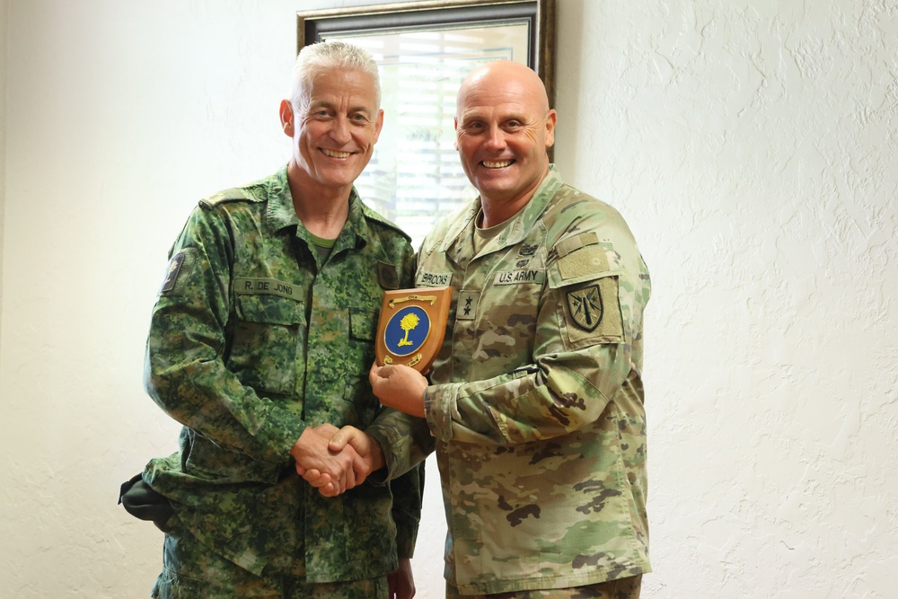 BG Roland De Jong exchanges gift during visit