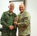 BG Roland De Jong exchanges gift during visit