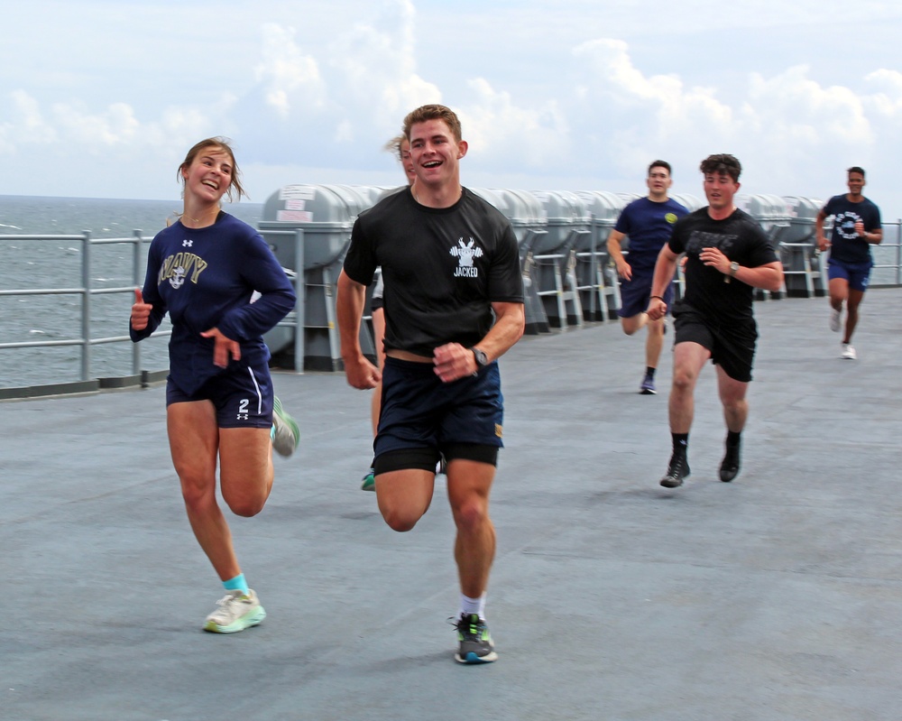 Midshipmen Participate in Group PT Aboard Mount Whitney