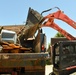Stamm loads a dump truck