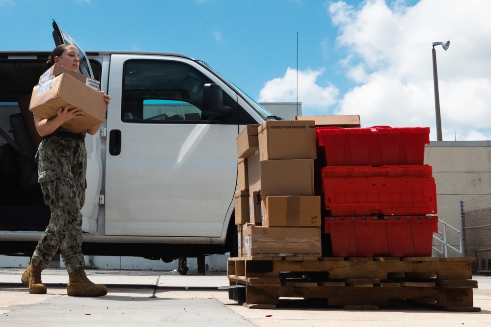 USNS Burlington loads supplies