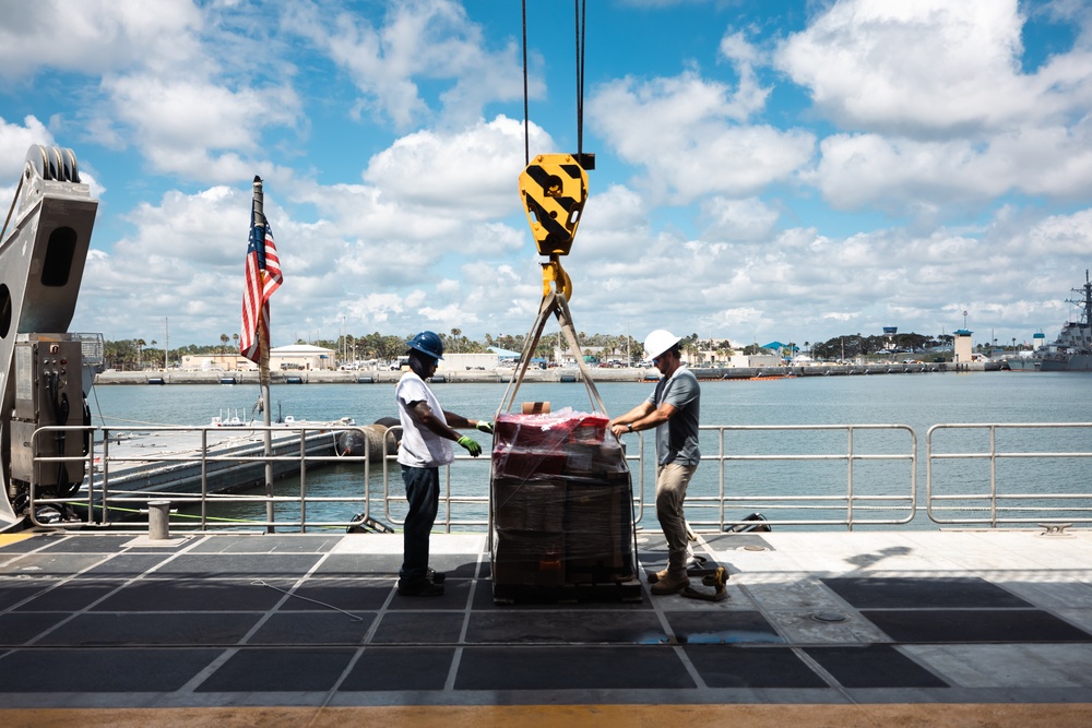USNS Burlington loads supplies