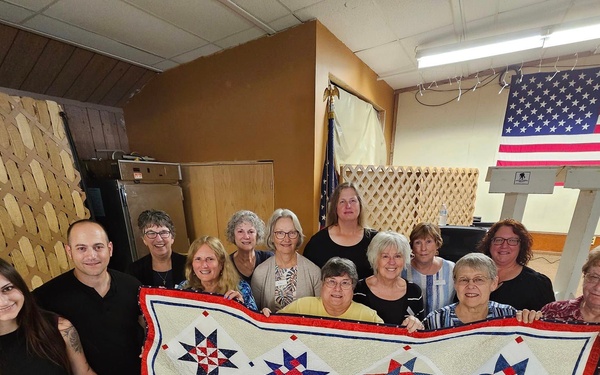 Fort McCoy dispatcher, Air Force veteran, receives Quilt of Valor in special ceremony