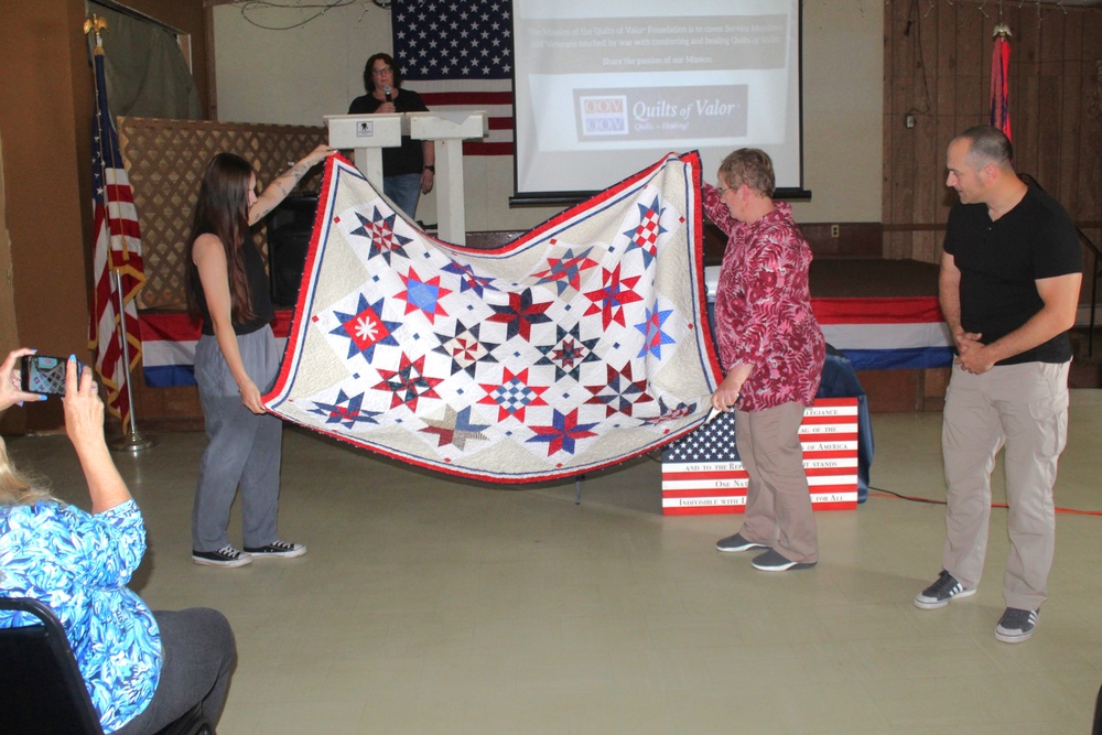 Fort McCoy dispatcher, Air Force veteran, receives Quilt of Valor in special ceremony