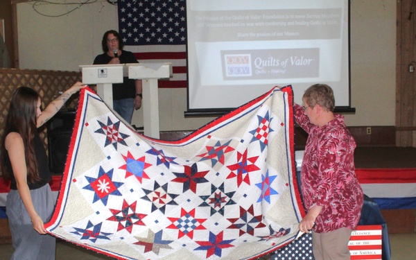 Fort McCoy dispatcher, Air Force veteran, receives Quilt of Valor in special ceremony