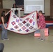 Fort McCoy dispatcher, Air Force veteran, receives Quilt of Valor in special ceremony