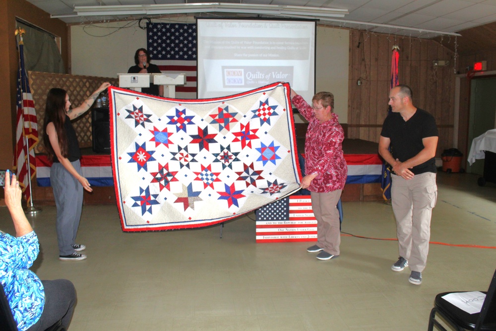 Fort McCoy dispatcher, Air Force veteran, receives Quilt of Valor in special ceremony