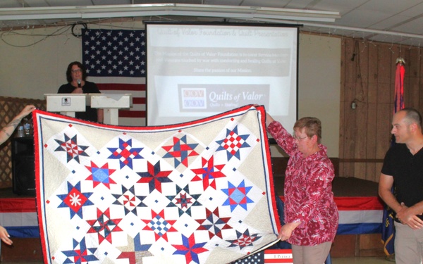 Fort McCoy dispatcher, Air Force veteran, receives Quilt of Valor in special ceremony