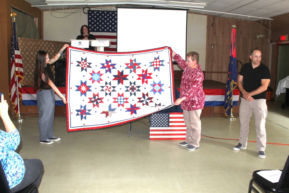 Fort McCoy dispatcher, Air Force veteran, receives Quilt of Valor in special ceremony