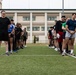 U.S. Marines and members of Japan Self Defense Force compete in a rugby match at Marine Corps Air Station Iwakuni