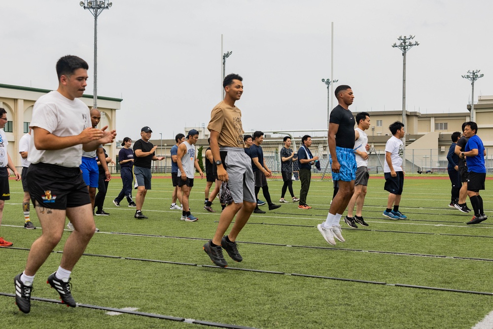 U.S. Marines and members of Japan Self Defense Force compete in a rugby match at Marine Corps Air Station Iwakuni