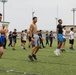 U.S. Marines and members of Japan Self Defense Force compete in a rugby match at Marine Corps Air Station Iwakuni