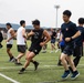 U.S. Marines and members of Japan Self Defense Force compete in a rugby match at Marine Corps Air Station Iwakuni