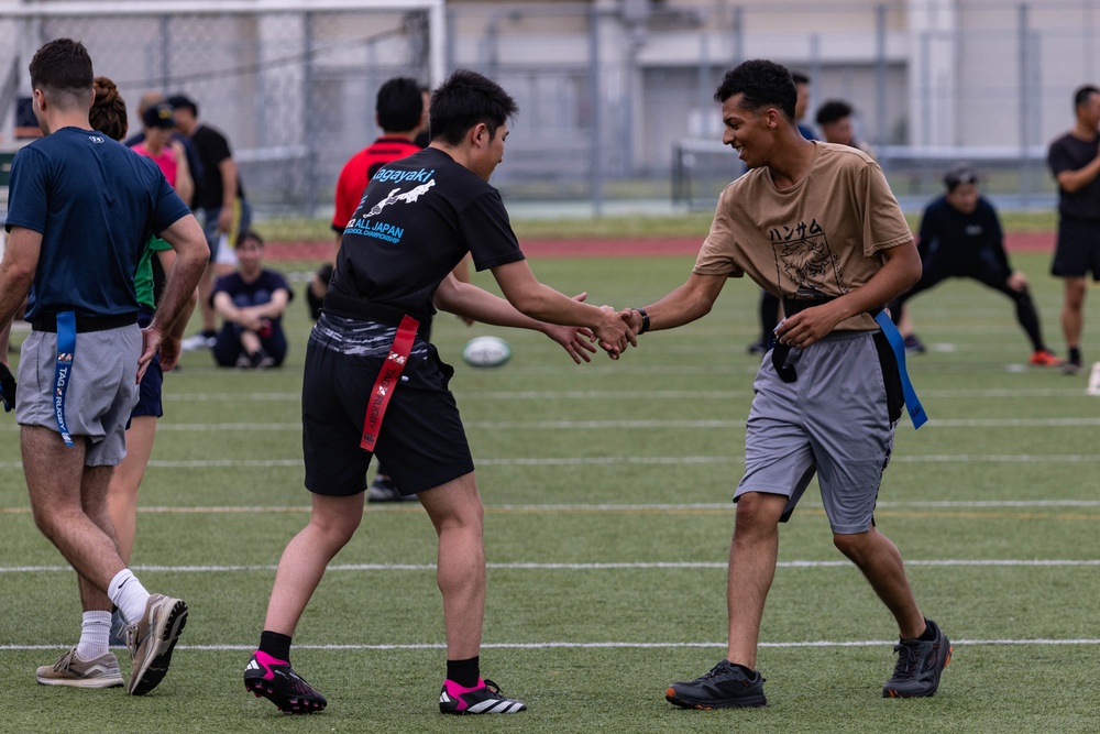 U.S. Marines and members of Japan Self Defense Force compete in a rugby match at Marine Corps Air Station Iwakuni