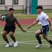 U.S. Marines and members of Japan Self Defense Force compete in a rugby match at Marine Corps Air Station Iwakuni