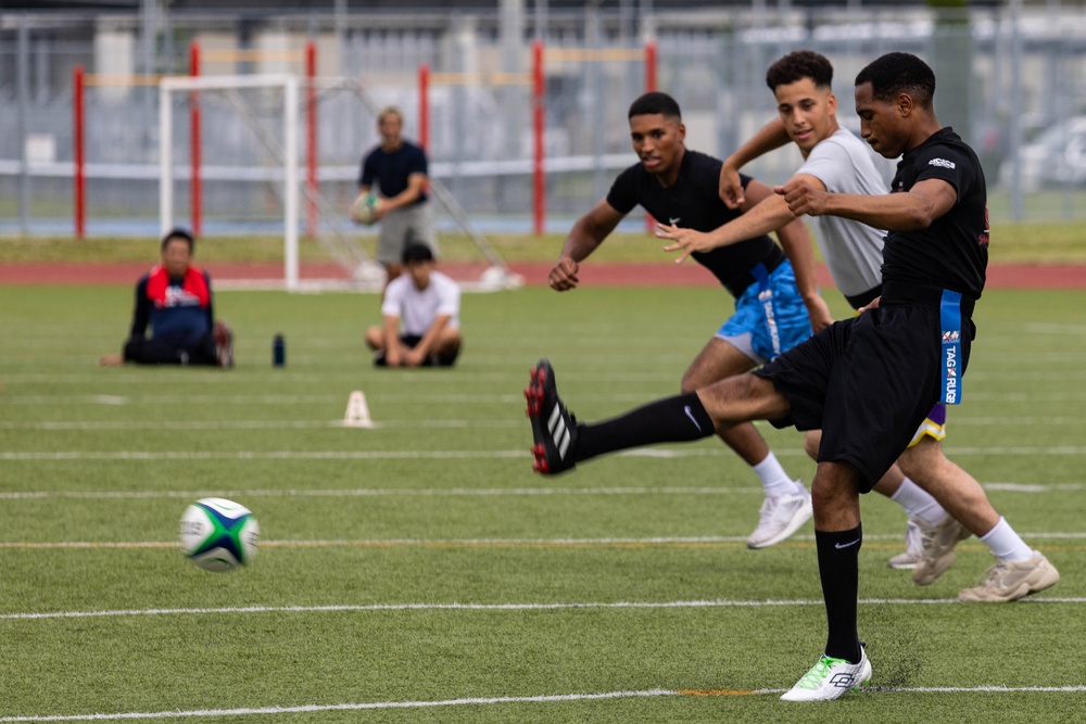 U.S. Marines and members of Japan Self Defense Force compete in a rugby match at Marine Corps Air Station Iwakuni