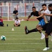 U.S. Marines and members of Japan Self Defense Force compete in a rugby match at Marine Corps Air Station Iwakuni