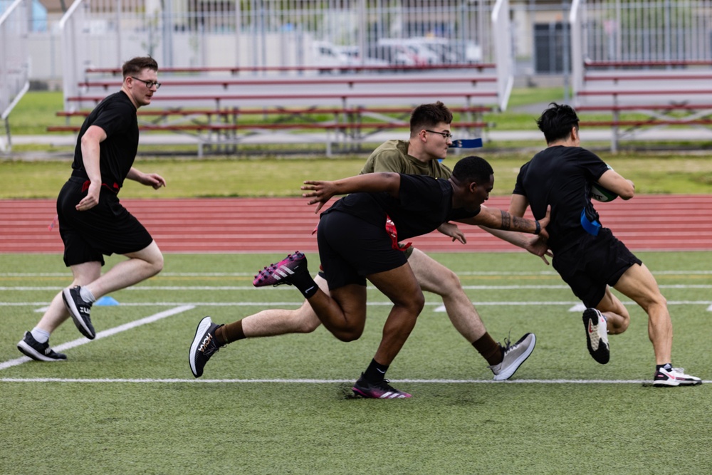 U.S. Marines and members of Japan Self Defense Force compete in a rugby match at Marine Corps Air Station Iwakuni