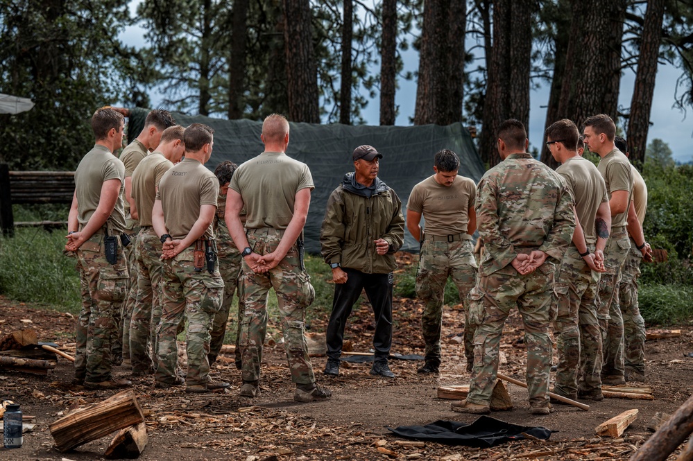 Survival, Evasion, Resistance, and Escape pre-team 25-A particpates in firecraft exercise