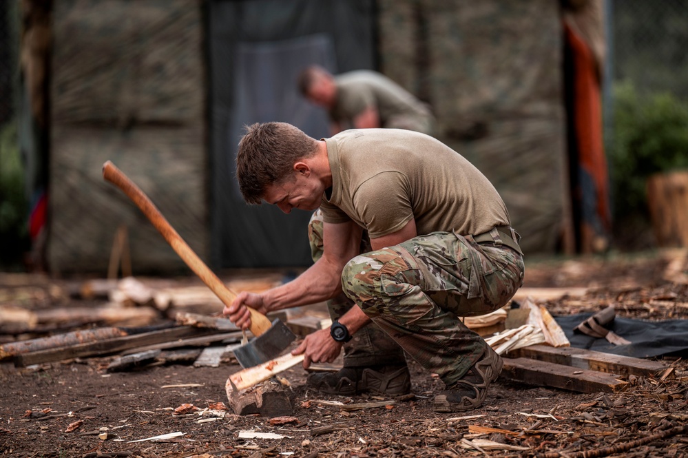 Survival, Evasion, Resistance, and Escape pre-team 25-A particpates in firecraft exercise