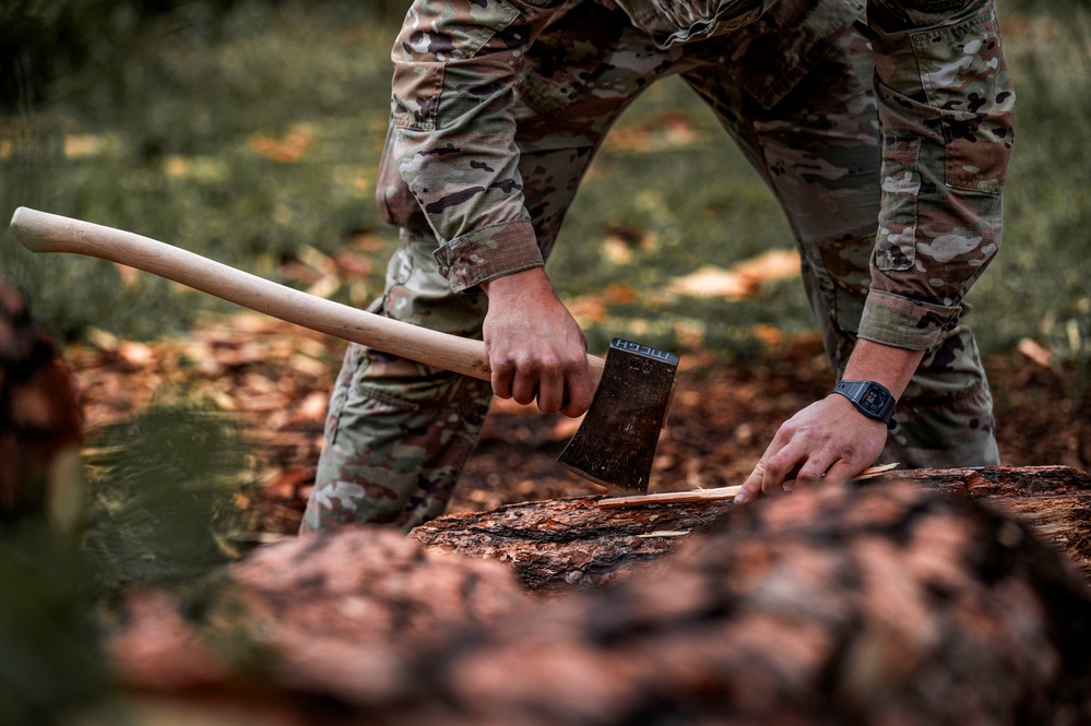 Survival, Evasion, Resistance, and Escape pre-team 25-A particpates in firecraft exercise