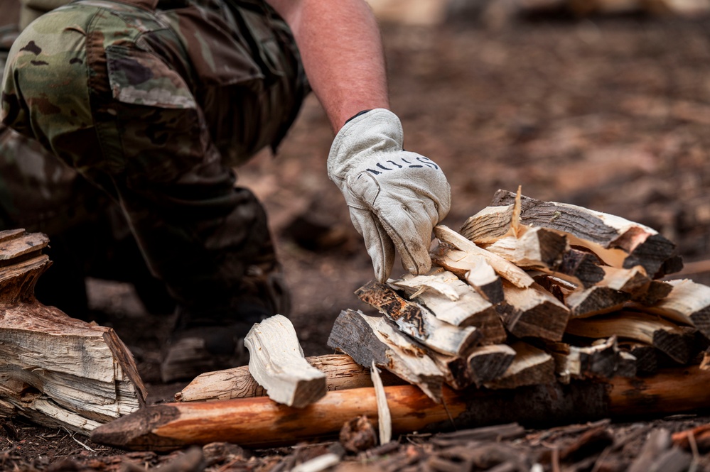 Survival, Evasion, Resistance, and Escape pre-team 25-A particpates in firecraft exercise