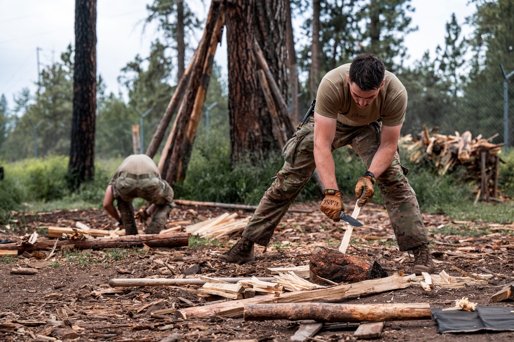 Survival, Evasion, Resistance, and Escape pre-team 25-A particpates in firecraft exercise