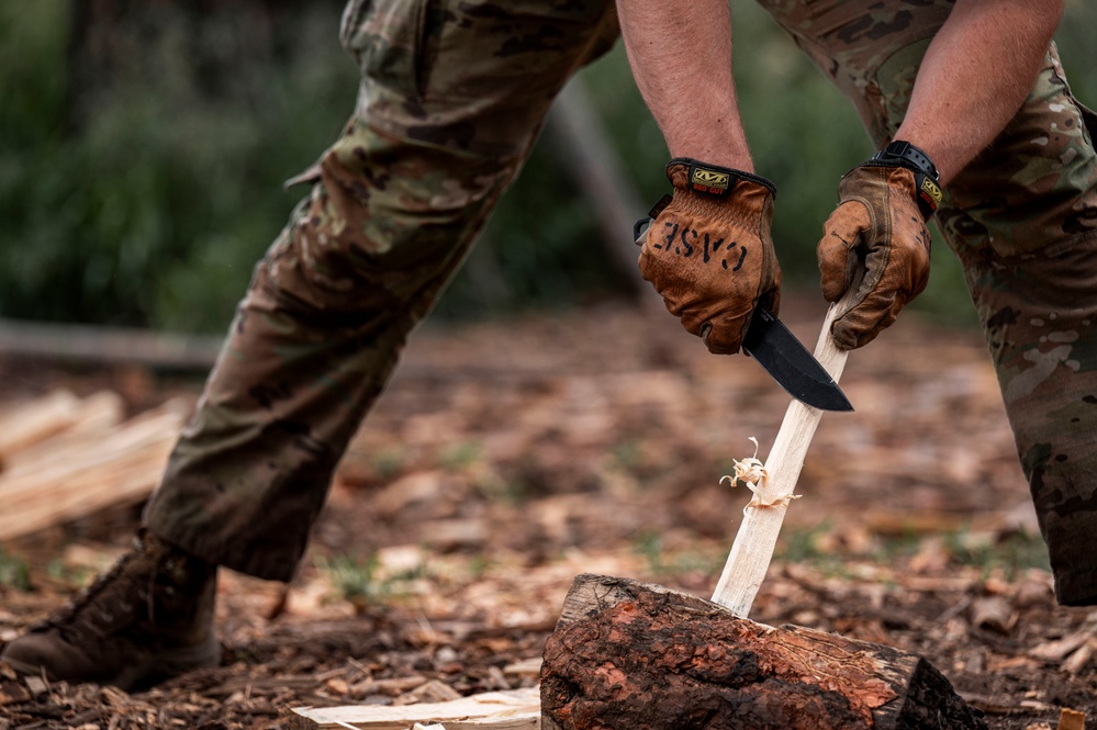 Survival, Evasion, Resistance, and Escape pre-team 25-A particpates in firecraft exercise