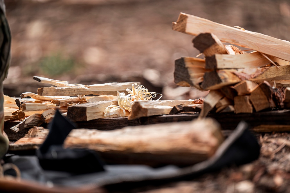 Survival, Evasion, Resistance, and Escape pre-team 25-A particpates in firecraft exercise
