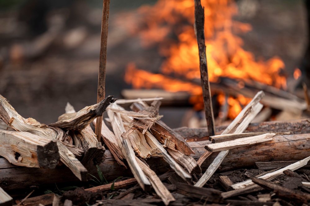 Survival, Evasion, Resistance, and Escape pre-team 25-A particpates in firecraft exercise