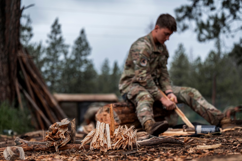 Survival, Evasion, Resistance, and Escape pre-team 25-A particpates in firecraft exercise