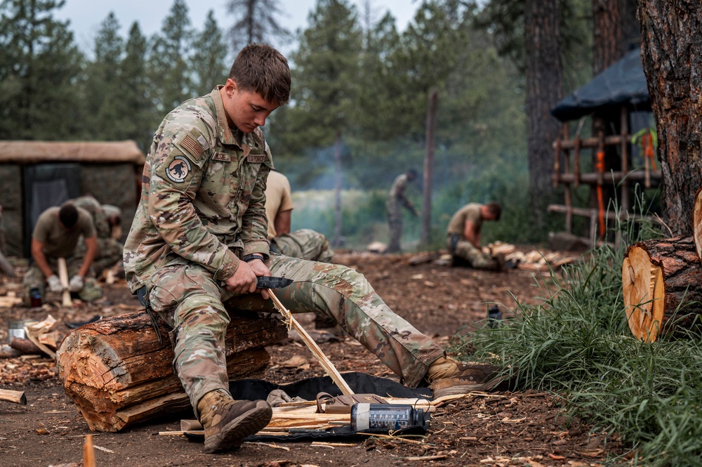 Survival, Evasion, Resistance, and Escape pre-team 25-A particpates in firecraft exercise