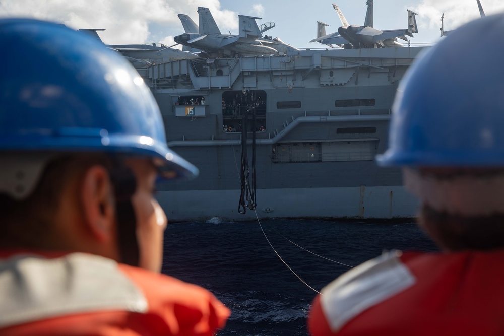 USS Robert Smalls (CG 62) conducts fueling-at-sea with USS Ronald Reagan (CVN 76)