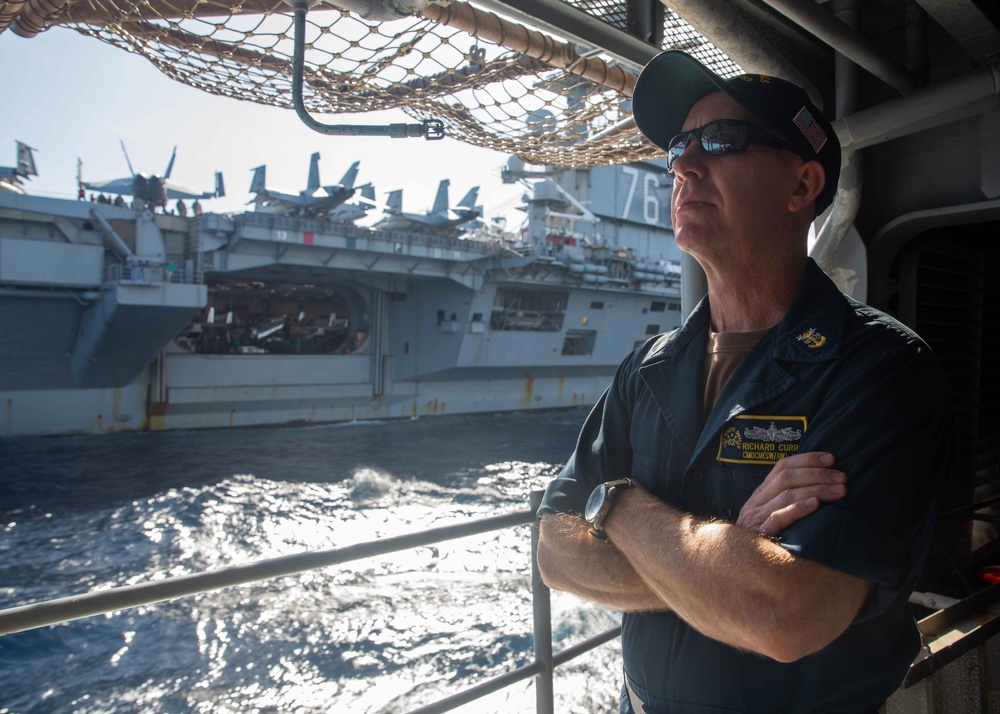 USS Robert Smalls (CG 62) conducts fueling-at-sea with USS Ronald Reagan (CVN 76)