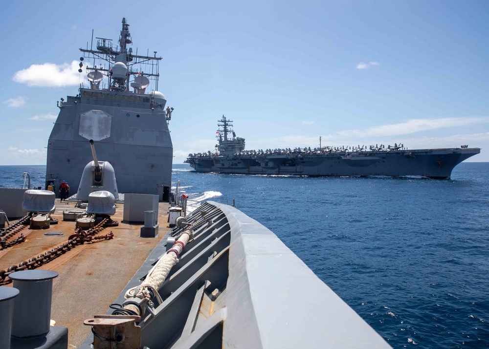 USS Robert Smalls (CG 62) conducts fueling-at-sea with USS Ronald Reagan (CVN 76)